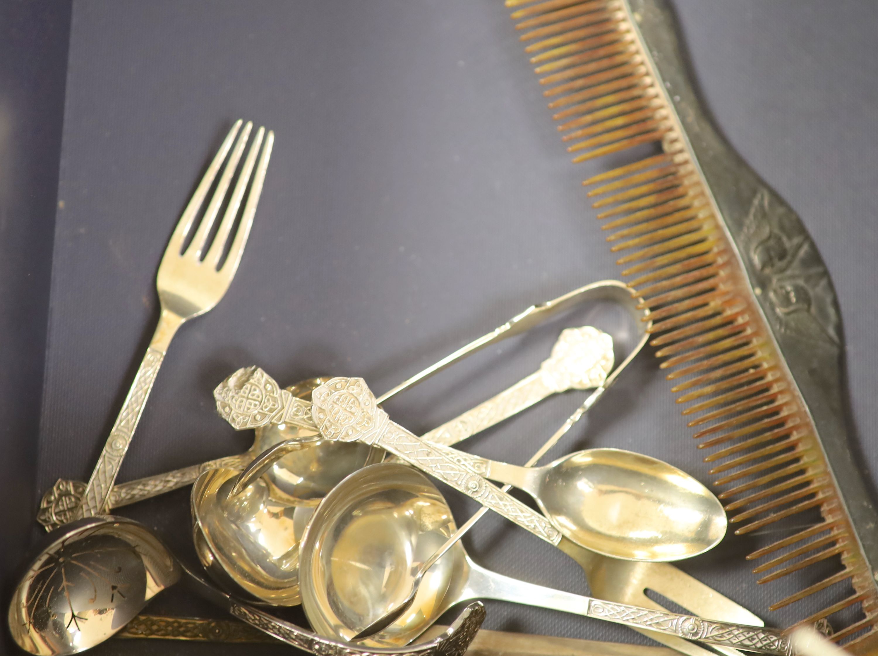 A matched seven piece silver mounted brush set, nine items of silver flatware, a silver bowl, pr candlesticks & three cased sets